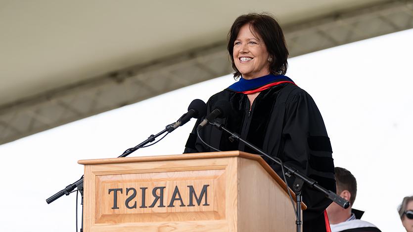 Image of Christine Brennan addressing graduates.